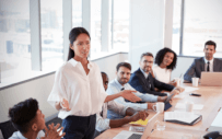 People sitting around conference table