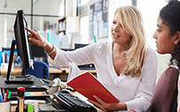 A career services professional works with a student.